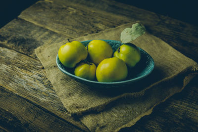 High angle view of fruits in bowl on table