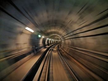 Blurred motion of railroad tracks in tunnel