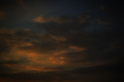 Low angle view of dramatic sky at sunset