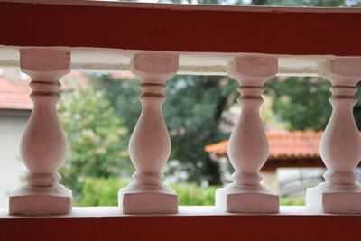 Thick balcony balustrade, carved columns on balcony