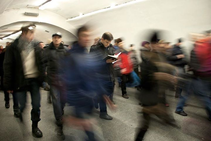 lifestyles, men, large group of people, leisure activity, person, full length, walking, street, blurred motion, transportation, casual clothing, city life, motion, togetherness, indoors, on the move, medium group of people, road, mixed age range