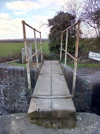 Walkway against sky