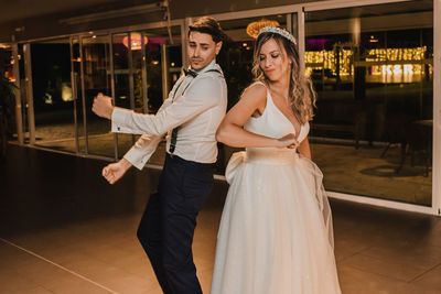 Bridegroom dancing during wedding ceremony