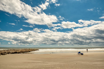 Scenic view of beach against sky