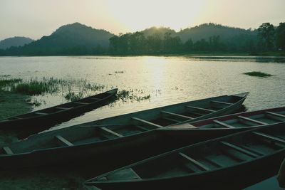 Scenic view of lake against sky during sunset