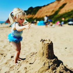 Full length of girl on sand at beach