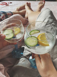 High angle view of woman holding drink