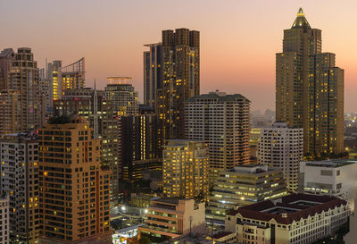 Modern buildings in city against sky