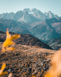 Aerial view of snowcapped mountains against clear sky