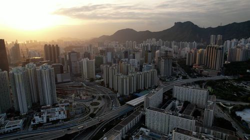 High angle view of cityscape against sky during sunset