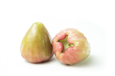 Close-up of apple against white background