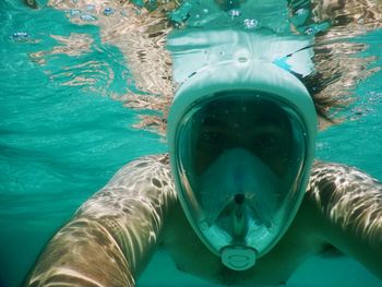 Man swimming in pool