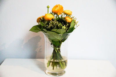 Close-up of flower vase on table