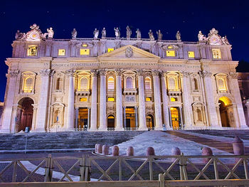 Low angle view of illuminated building at night
