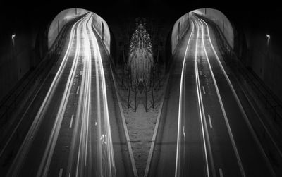 Digital composite image of light trails in city
