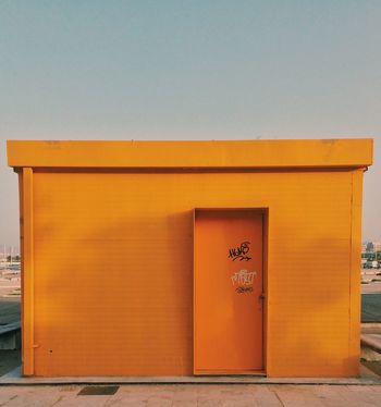 CLOSED DOOR OF BUILDING DURING SUNSET