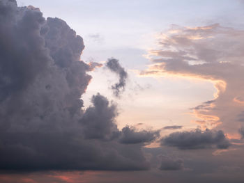 Low angle view of dramatic sky during sunset