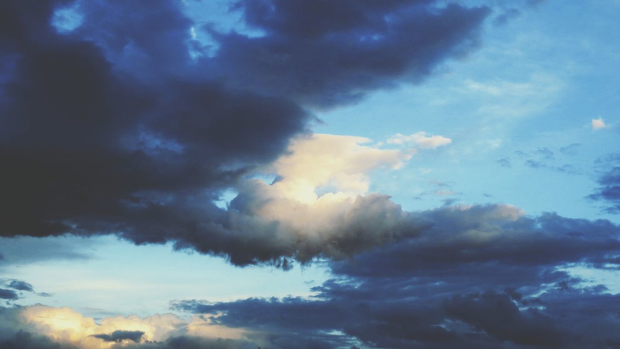 cloud - sky, sky, cloudy, low angle view, beauty in nature, scenics, nature, cloud, tranquility, cloudscape, weather, sky only, tranquil scene, idyllic, blue, overcast, dramatic sky, outdoors, storm cloud, no people