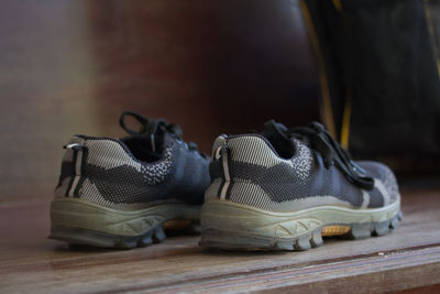 Close-up of shoes on table