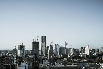 Cityscape against clear sky