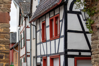 View through an arch at a row of half-timbered houses in bad muenstereifel, germany