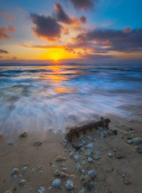 Scenic view of sea against sky during sunset