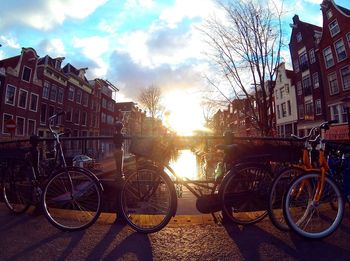 Bicycles against sky in city