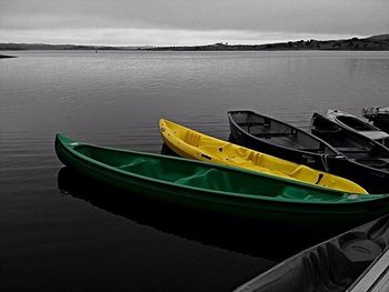 Boats moored in sea