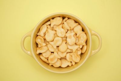 Directly above shot of pasta in bowl against white background