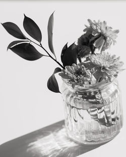 Close-up of flower vase on table