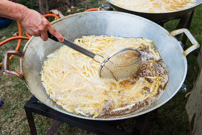 Close-up of person preparing food