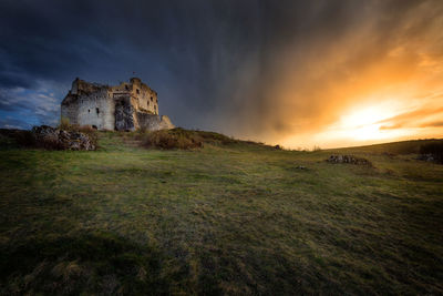 Scenic view of landscape against sky during sunset