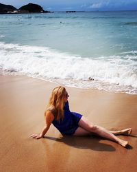 Young woman relaxing at beach