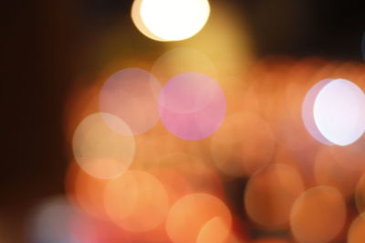 Defocused image of illuminated lights at night