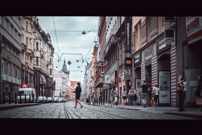 Man walking on street in city