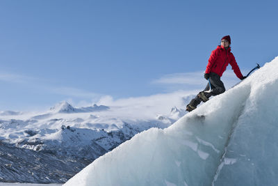 Scenic view of snowcapped mountain against sky during winter