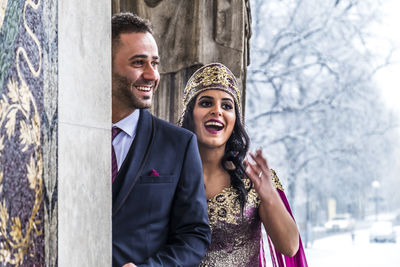 Bride with bridegroom during weeding ceremony