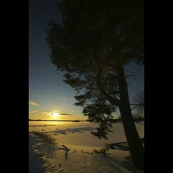 Scenic view of sunset over river