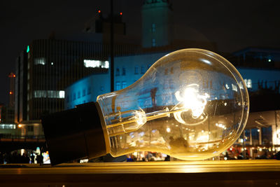 Close-up of illuminated light at night