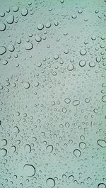 Close-up of water drops on glass