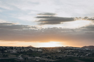 Scenic view of landscape against sky during sunset