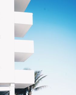 Low angle view of building against blue sky