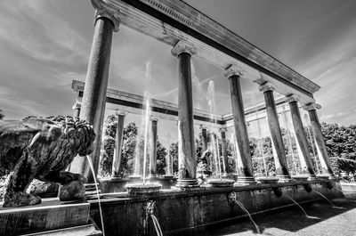 Fountain in park against sky