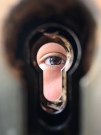 Close-up portrait of woman photographing