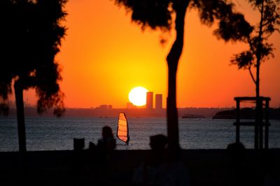 Scenic view of sea against sky during sunset