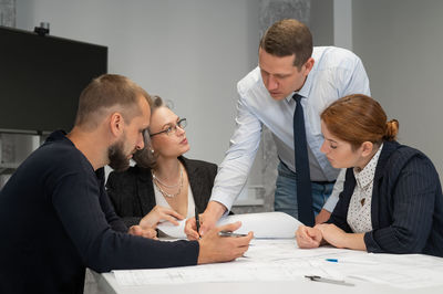 Business colleagues working at office