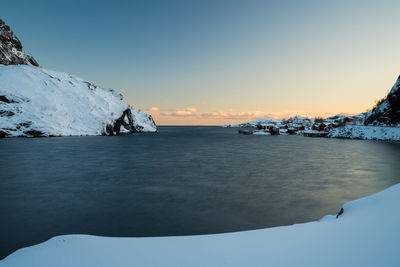 Scenic view of sea against sky during winter