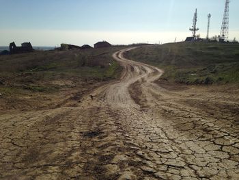 Dirt road passing through landscape