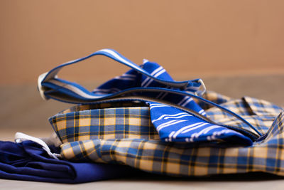 Close-up of shoes on table