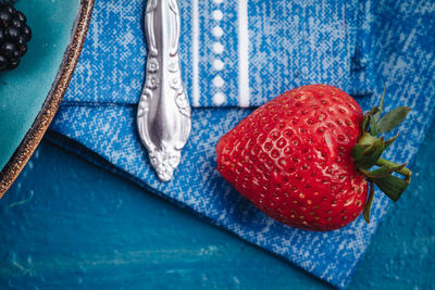 High angle view of strawberries on table